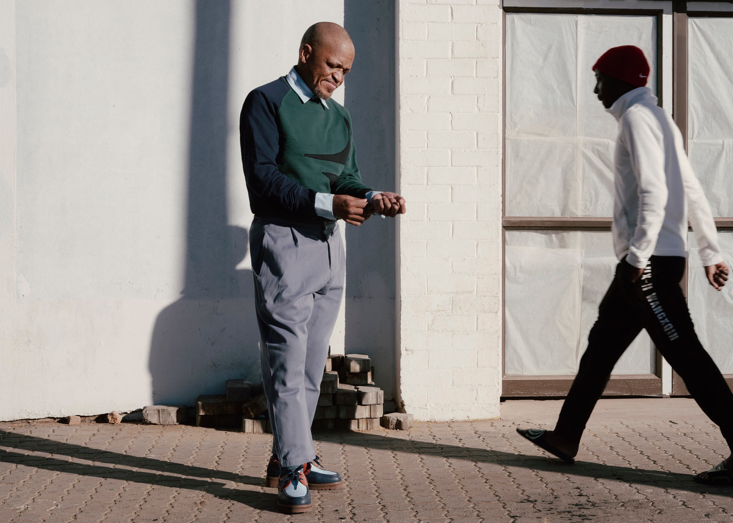 Felipe Mazibuko by Art Verrips ft FIELDS x Renee Roussouw, 1 pocket shirt, and Folkstone Grey Weekend Trousers