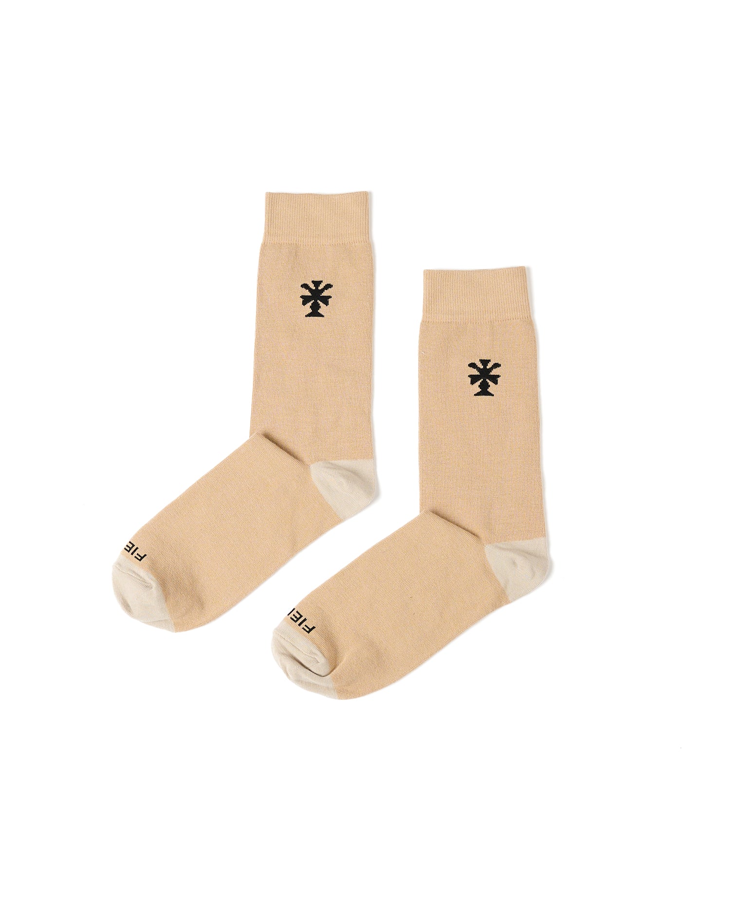 Pair of beige socks with a black logo on a white background